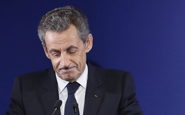 Former French President Nicolas Sarkozy delivers a speech after being defeated on the first round of the French right wing party 'Les Republicains' primaries in Paris, France, Sunday, Nov. 20, 2016. Former French prime minister Francois Fillon had the largest share of votes in early returns Sunday from the first round of the conservative primary for next year's presidential election. 
