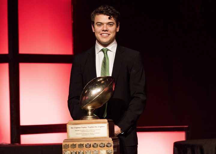 Regina Rams quarterback Noah Picton poses with the Hec Crighton Trophy for the most outstanding Canadian player in CIS football during the CIS awards gala in Hamilton, Ont., on Thursday, November 24, 2016. 