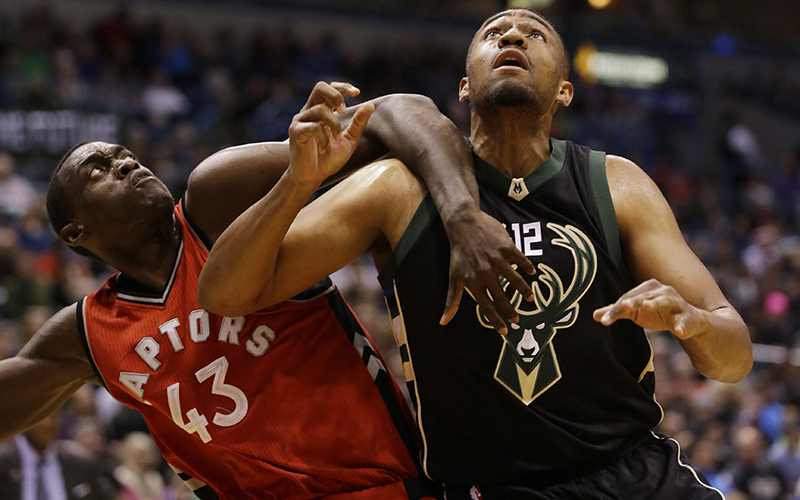 Toronto Raptors' Pascal Siakam and Milwaukee Bucks' Jabari Parker fight for position during the second half of an NBA basketball game Friday, Nov. 25, 2016, in Milwaukee. 