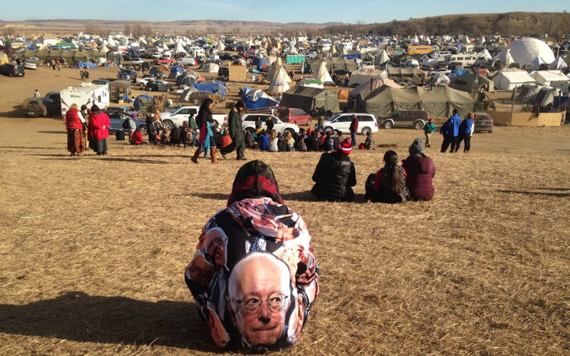 Protesters gather at an encampment on Saturday, Nov. 26, 2016, a day after tribal leaders received a letter from the U.S. Army Corps of Engineers that told them the federal land would be closed to the public on Dec. 5, near Cannon Ball, N.D. The protesters said that they do not plan to leave and will continue to oppose construction of the Dakota Access oil pipeline.