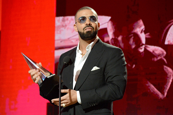 Recording artist Drake accepts the Favorite Artist (Rap/Hip-Hop) award onstage at the 2016 American Music Awards at Microsoft Theater on November 20, 2016 in Los Angeles, California.  (Photo by Kevin Mazur/AMA2016/WireImage).
