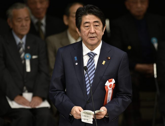 Japan's Prime Minister Shinzo Abe delivers a speech during a rally calling for the return of all four Russian-held islands located off Japan's northern island of Hokkaido in Tokyo, Japan, 07 February 2016. 