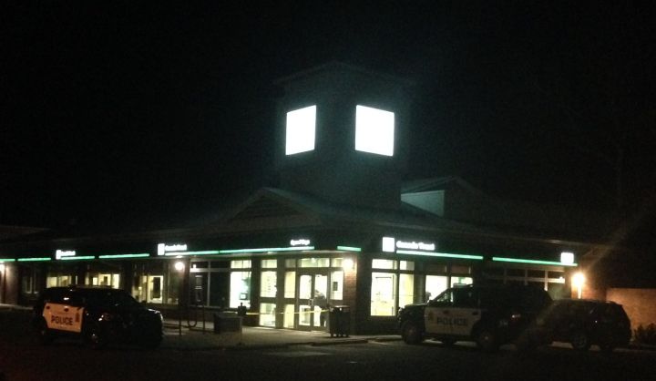 Edmonton police investigate a bank robbery in north Edmonton on Nov. 25, 2016.