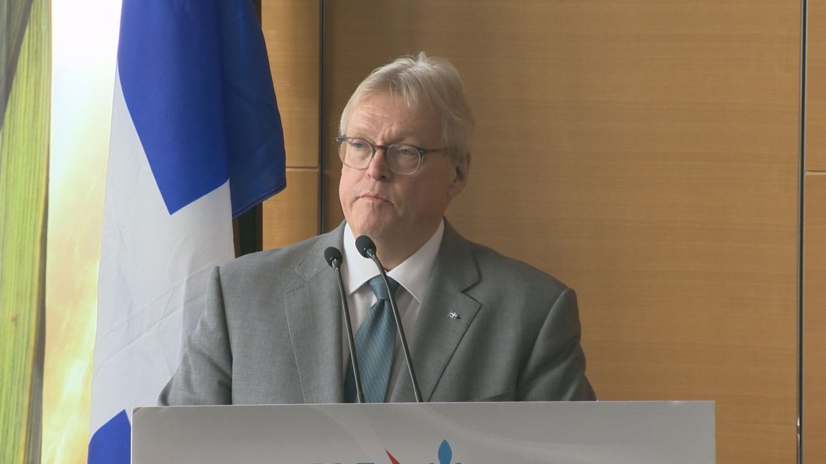 Inthis file photo, Health Minister Gaétan Barrette announces $20 million to reopen 18 operating throughout Quebec. The ethics commissioner announced it is investigating the minister for a potential conflict of interest. Saturday, Feb. 25, 2017.