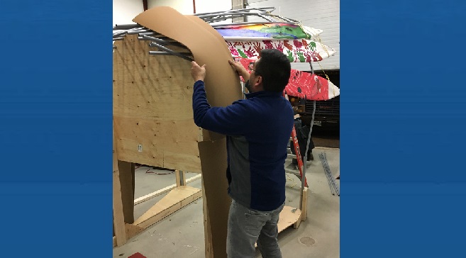 David Thomas, an Indigenous architect working on the float.