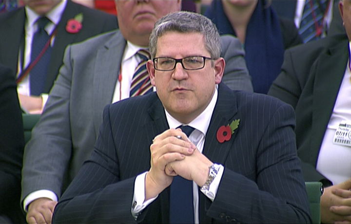 Andrew Parker the head of M15 is seen attending an Intelligence and Security Committee hearing at Parliament, in this still image taken from video in London November 7, 2013. REUTERS/UK Parliament via REUTERS TV/Files.