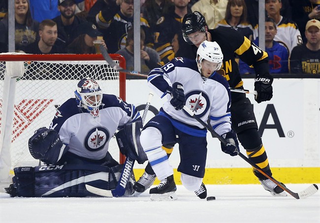 Boston Bruins score three goals in second period to beat Winnipeg Jets 4-1 - image