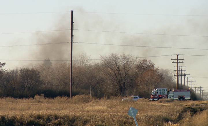 A car fire at the corner of Highway 7 and 11th Street is believed to be human-caused, according to the Saskatoon Fire Department.