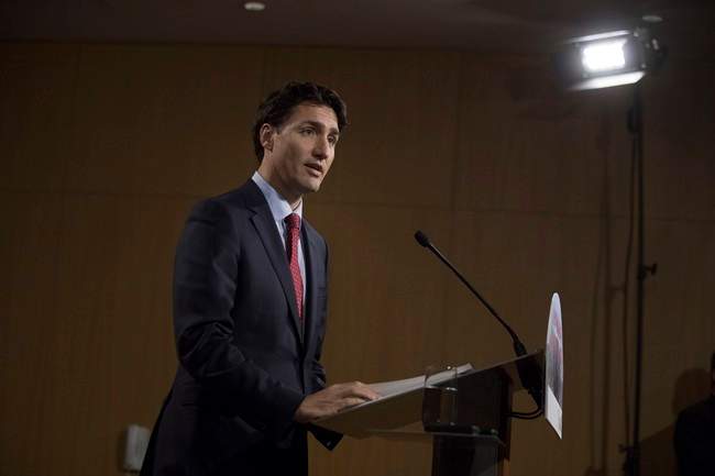 Canadian Prime Minister Justin Trudeau addresses the media following a summit meeting in Toronto with investors and members of the Canadian government, on Monday, November 14 , 2016. 