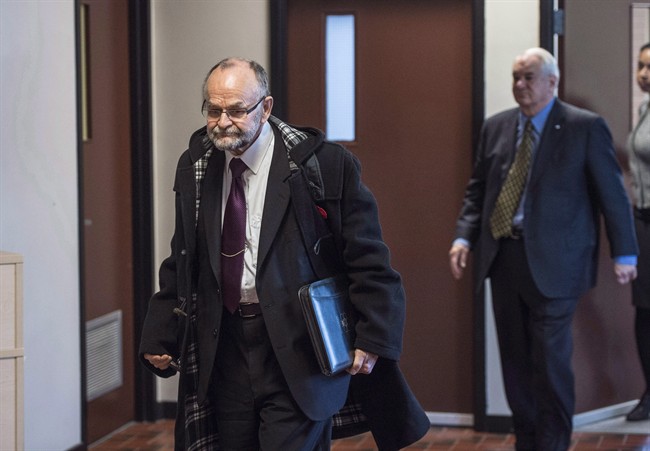 Toronto pastor Brent Hawkes, left, walks with his lawyer Clayton Ruby, right, before his trial related to decades-old sex crime allegations at provincial court in Kentville, N.S. on Monday, November 14, 2016. The complainant in the indecent assault and gross indecency trial of a well-known Toronto pastor has resumed testimony in Kentville, N.S. THE CANADIAN PRESS/Darren Calabrese.