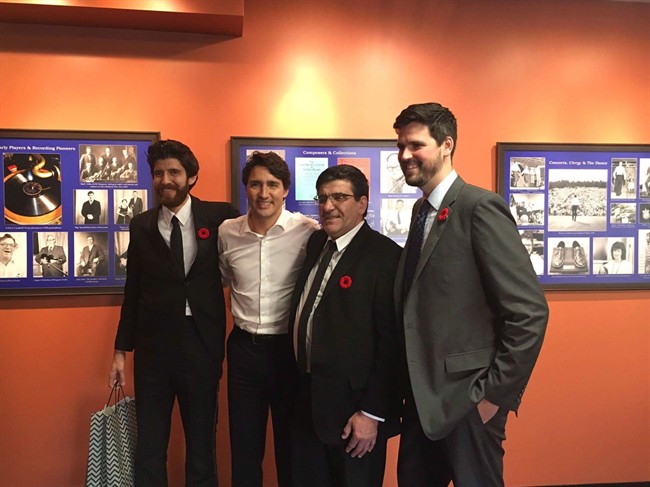 Prime Minister Justin Trudeau poses for a photo with members of the Hadhad family, including Tareq (left)  in an undated handout photo. 