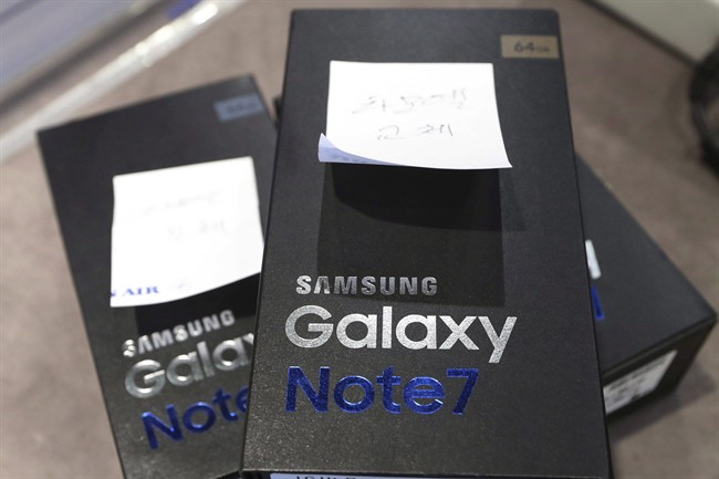 In this Thursday, Oct. 13, 2016, file photo, returned boxes of Samsung Electronics' Galaxy Note 7 smartphones are placed at a shop of South Korean mobile carrier in Seoul, South Korea. THE CANADIAN PRESS/ AP Photo/Lee Jin-man, File.