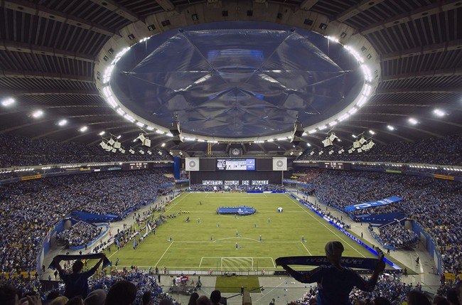 Montreal Impact fans cheer on their team prior to the first leg of the MLS Eastern Conference final against Toronto FC at the Olympic Stadium in Montreal, Tuesday, November 22, 2016.