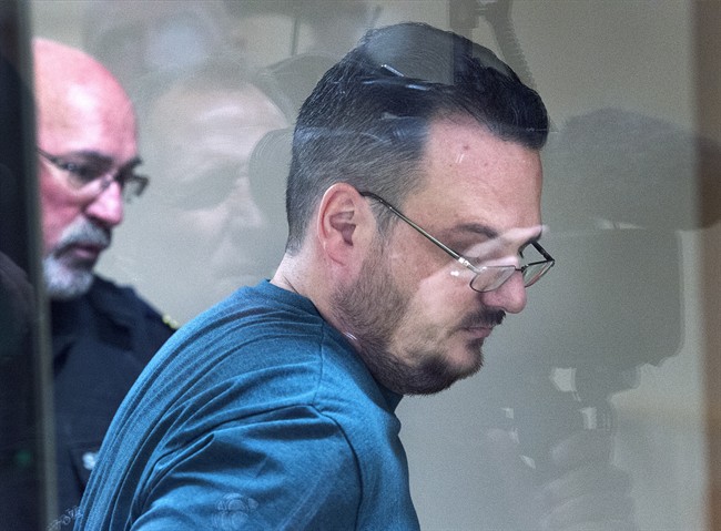 Jean-Claude Savoie goes through the security check as he arrives at court in Campbellton, N.B., on Tuesday, Nov. 1, 2016.  THE CANADIAN PRESS/Andrew Vaughan.