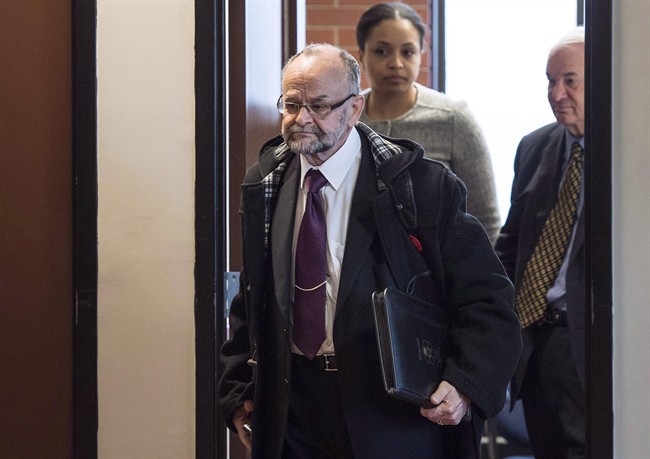 Toronto pastor Brent Hawkes, left, walks with his lawyer Clayton Ruby, right, before his trial related to decades-old sex crime allegations at provincial court in Kentville, N.S. on Monday, November 14, 2016. 