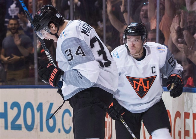 Team North America's Auston Matthews celebrates his goal with teammate Connor McDavid, right, against Sweden during first period World Cup of Hockey action in Toronto, Wednesday September 21, 2016. The NHL's last two No. 1 overall picks will meet for the first time tonight as Matthews' Toronto Maple Leafs host McDavid's Edmonton Oilers.