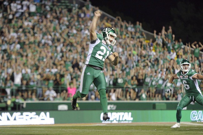 Saskatchewan Roughriders kicker Tyler Crapigna celebrates after kicking the game-winning field goal against the Ottawa Redblacks during CFL action in Regina on Friday, July 22, 2016. Kickers Sean Whyte and Crapigna, receiver Andy Fantuz and linebacker Bear Woods were all double nominees in the opening-round of voting for the CFL's outstanding player awards.