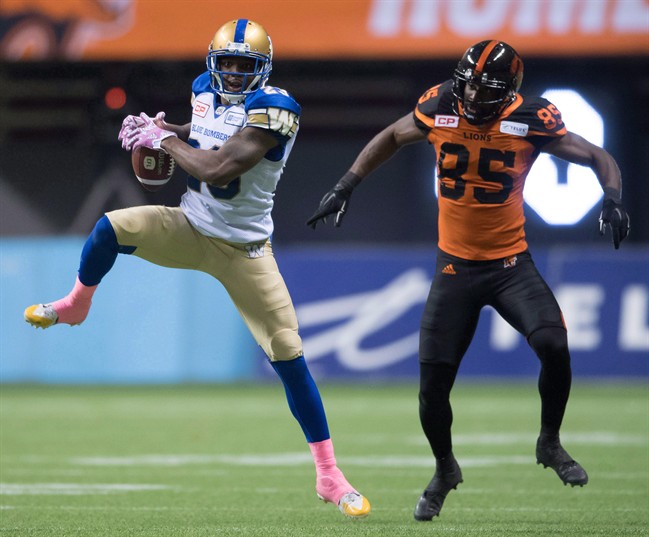 Winnipeg Blue Bombers' Kevin Fogg, shown here intercepting ts a pass intended for B.C. Lions' Shawn Gore Oct. 14/16.