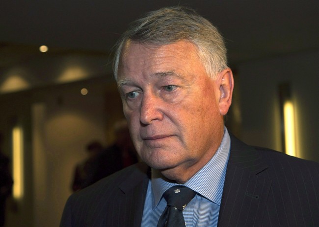 Federal Court Justice Robin Camp leaves a Canadian Judicial Council inquiry in a Calgary hotel, Friday, September 9, 2016. 