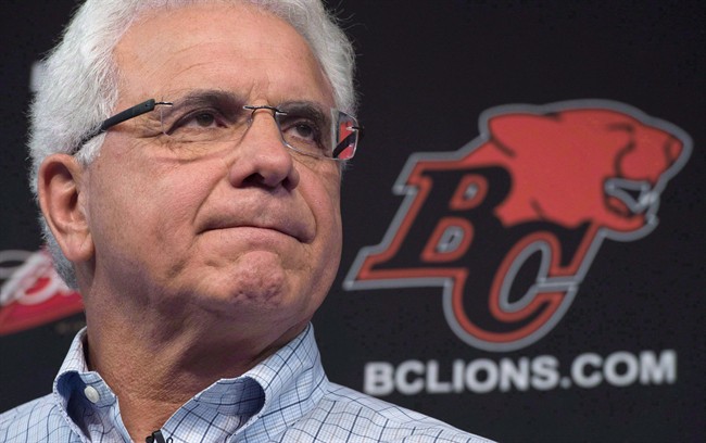 B.C. Lions head general manager Wally Buono pauses for a moment during a news conference at the teams practice facility in Surrey, B.C., on Nov. 17, 2014.