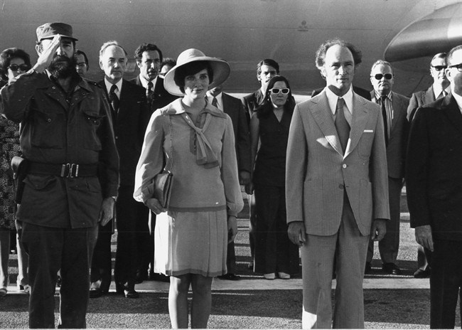 Prime Minister Pierre Trudeau and wife Margaret and Cuban President Fidel Castro listen to the national anthems of both countries after the Trudeaus arrived in Havana, Cuba, Jan.26, 1976.