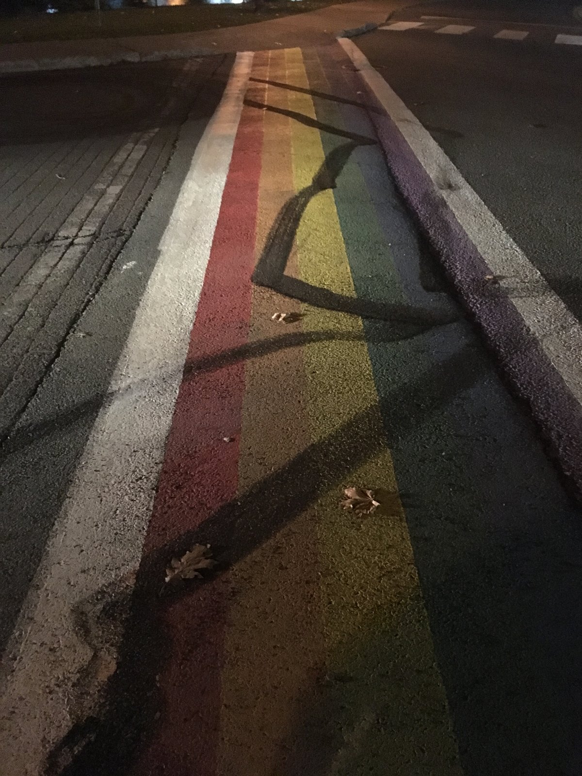 New Glasgow Police continue to investigate after this Pride crosswalk was damaged in an incident early Nov. 11, 2016. A man faces impaired driving charges after leading police on a chase through downtown New Glasgow on his ATV. Police say the damage to the crosswalk is intentional and also charged the man with mischief.