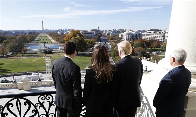 House Speaker Paul Ryan, left, shows President-elect Donald Trump, his wife Melania and Vice president-elect Mike Pence the view from the Speaker's Balcony on Capitol Hill in Washington, Thursday, Nov. 10, 2016.