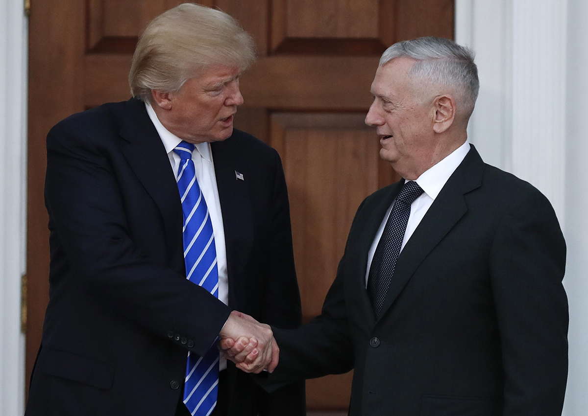 President-elect Donald Trump shakes hands with retired Marine Corps Gen. James Mattis as he leaves Trump National Golf Club Bedminster clubhouse in Bedminster, N.J., Saturday, Nov. 19, 2016. 