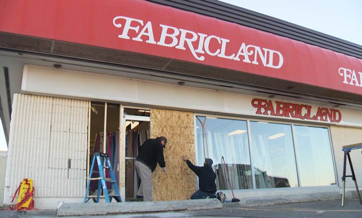 Saskatoon police say charges are pending as they investigate a crash where a vehicle wound up inside a business on Sunday.