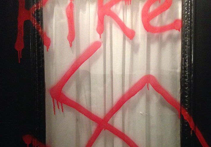 An Ottawa rabbi's front door is spraypainted with a swatika and racist slur.