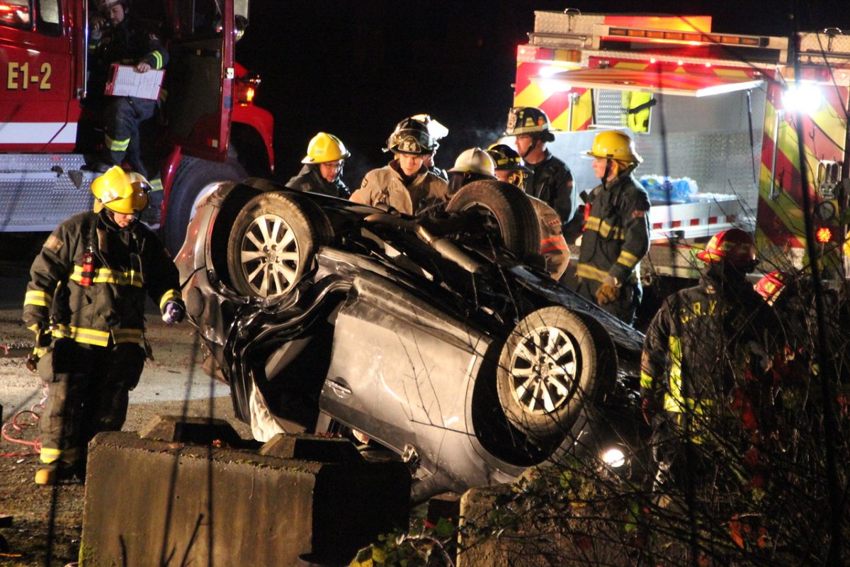 Emergency crews on scene after a car flipped over in Chilliwack.