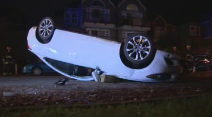 Driver escapes with minor injuries after car flips onto its roof in Vancouver’s Westside - image