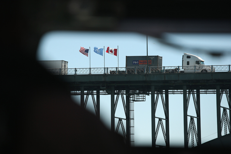 Trucks cross the Peace Bridge over the Niagara River in this file image. 