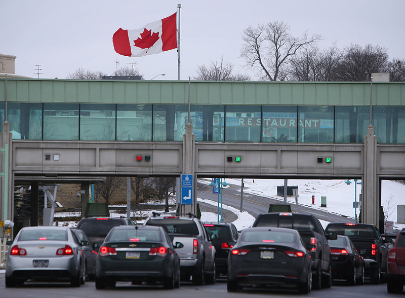 Vehicles make their way through the Canadian border crossing in Niagara Falls, Ontario, in January of 2016. 
