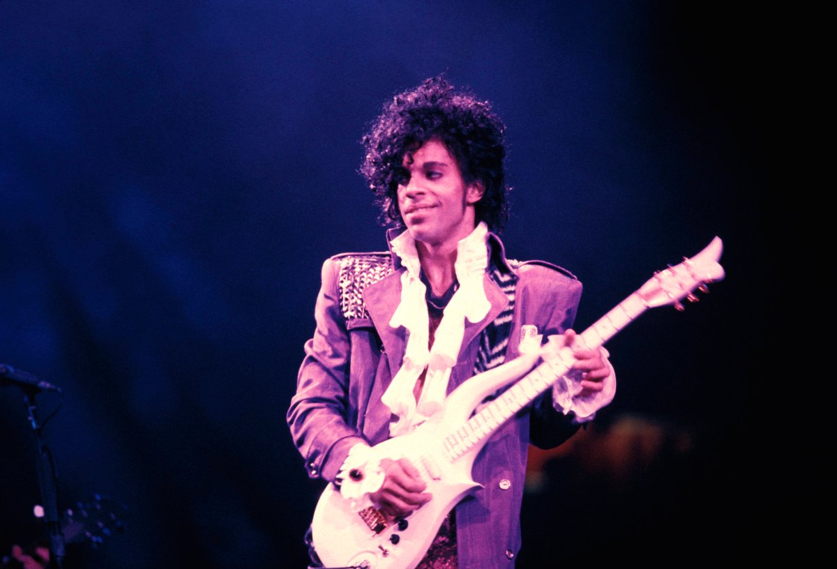 Prince performing on stage - Purple Rain Tour.