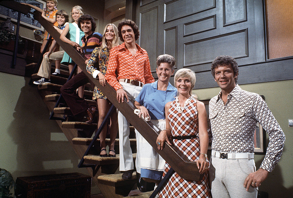 Mike Brady (Robert Reed), an architect with three sons, married Carol (Florence Henderson), a widow with three daughters. Their children were, from bottom: Greg (Barry Williams), Marcia (Maureen McCormack), Peter (Christopher Knight), Jan (Eve Plumb), Bobby (Mike Lookinland) and Cindy (Susan Olsen). Alice (Ann B. Davis) was the family’s housekeeper. (Photo by ABC Photo Archives/ABC via Getty Images)