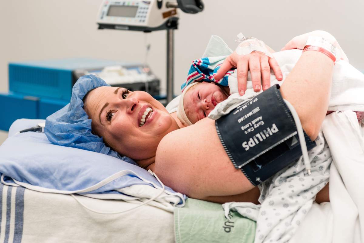 Robin Forslund holds baby Ainsley skin to skin after c-section.