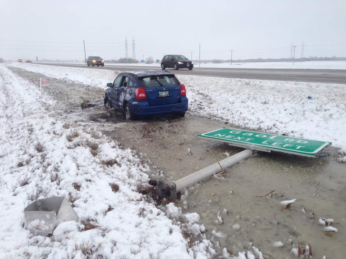 Car in ditch near Headingley, Man., Tuesday morning .