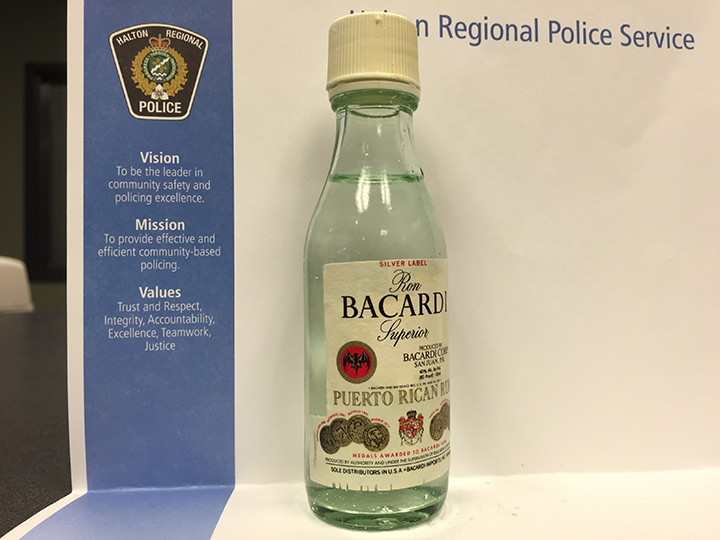 Police say a small liquor bottle was found in a 12-year-old Milton, Ont., girl's trick-or-treat bag.