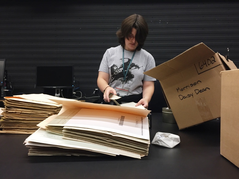 An employee sorts files from the First World War at the preservation centre in Gatineau.