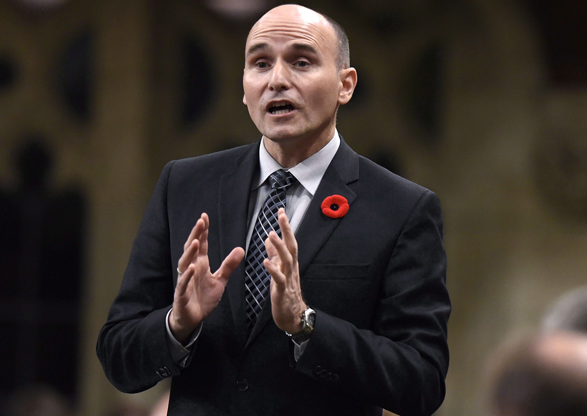 Minister of Families, Children and Social Development Jean-Yves Duclos rises during Question Period on Parliament Hill, Friday, Oct. 28, 2016 in Ottawa. 