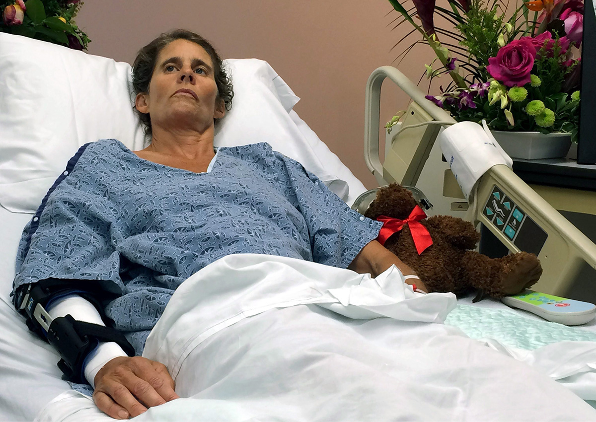 Maria Korcsmaros recovers after being bitten by a shark in her hospital bed at Orange County Global Medical Center in Santa Ana, Calif., on Tuesday, June 7, 2016. 