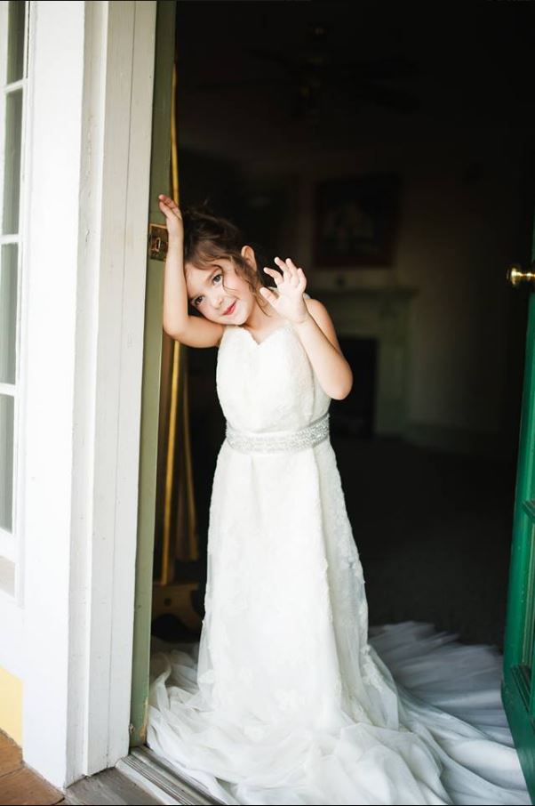 Girl wears late mother’s wedding dress, fulfilling her last wish - image