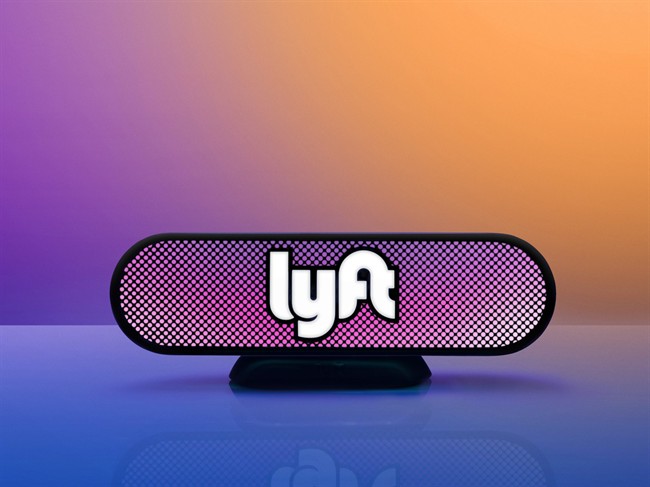 This undated photo provided by Lyft shows an illuminated Lyft beacon. Ride-hailing service Lyft, the underdog rival to Uber, is getting rid of its iconic pink moustache logo and replacing it with something more useful: a beacon. 