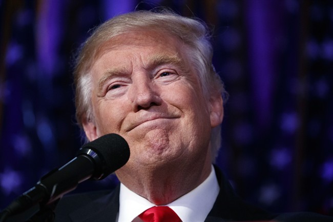 President-elect Donald Trump smiles as he arrives to speak at an election night rally, Wednesday, Nov. 9, 2016, in New York. (AP Photo/ Evan Vucci).