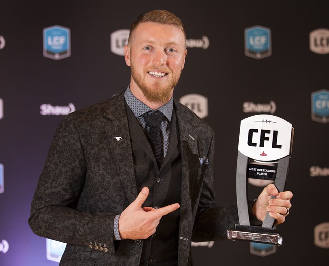 Bo Levi Mitchell with MOP award.