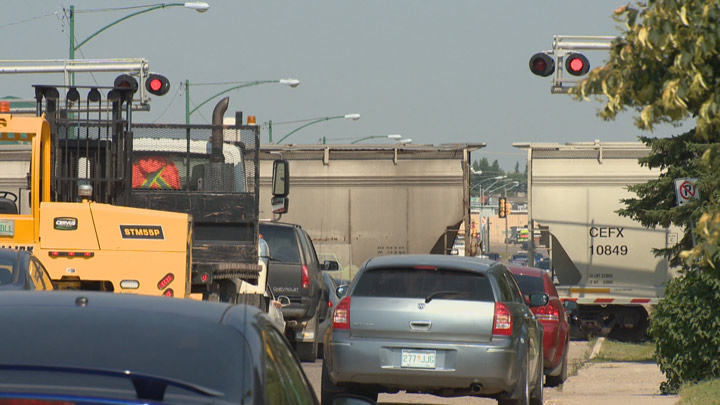 A new report from SREDA say delays at major railway crossings in the Saskatoon region is costing businesses $2.5 million yearly in lost productivity.