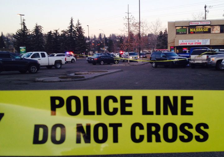 Police on scene at an officer-involved shooting in northwest Calgary Tuesday.