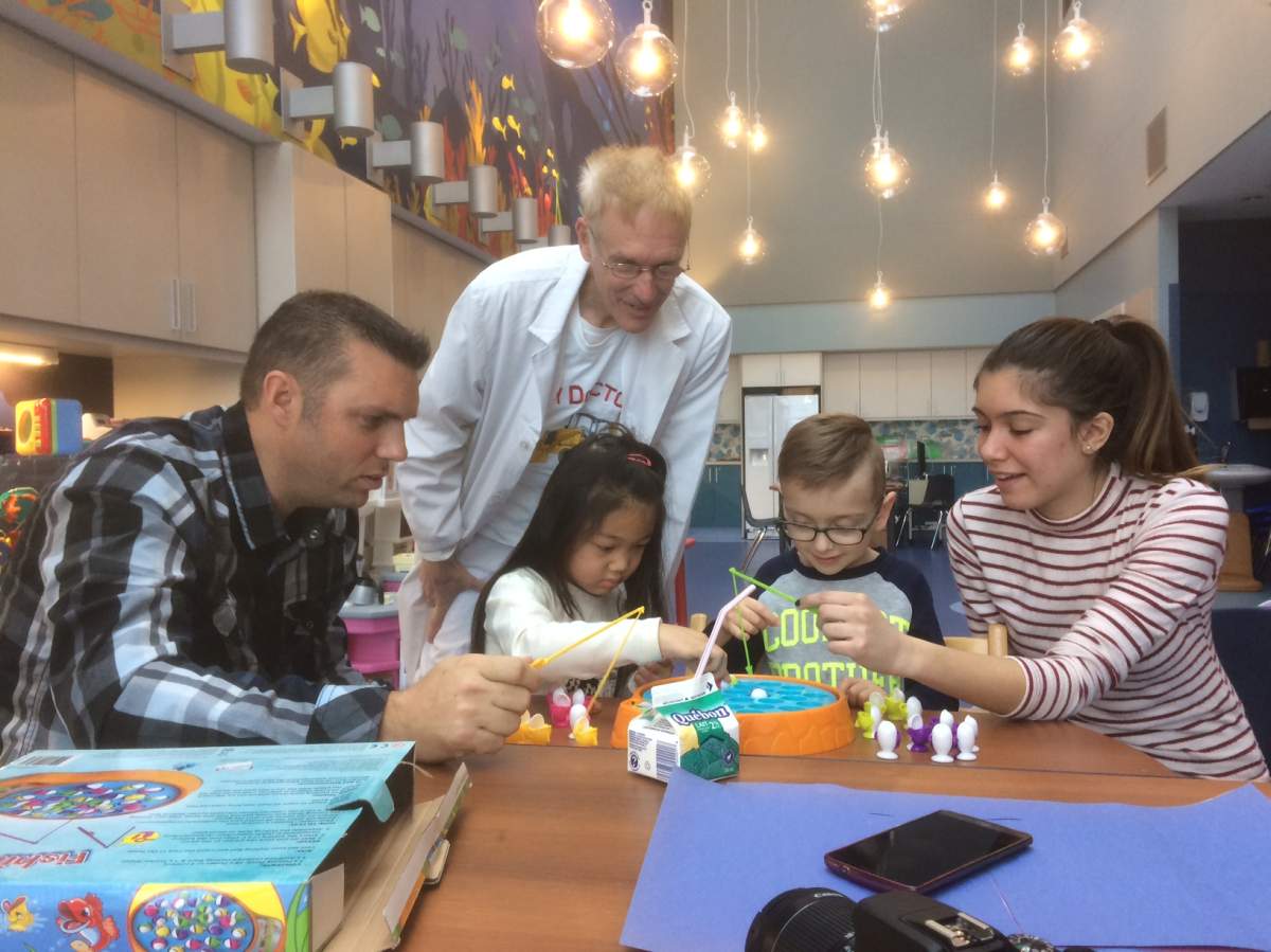 Norman Brown, the toy doctor, visits children at the Montreal Shriners Hospital, Tuesday, November 22, 2016.