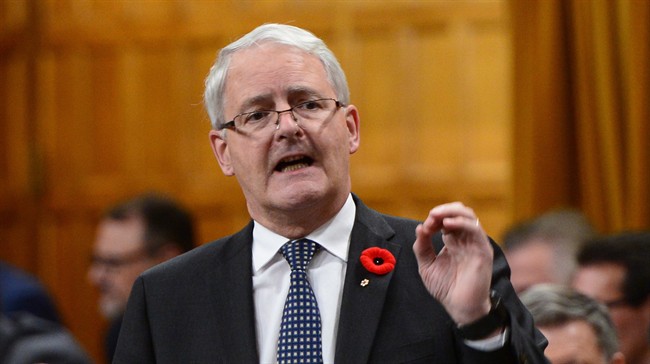 Minister of Transport Marc Garneau stands during question period in the House of Commons on Parliament Hill in Ottawa on Monday, Oct. 31, 2016